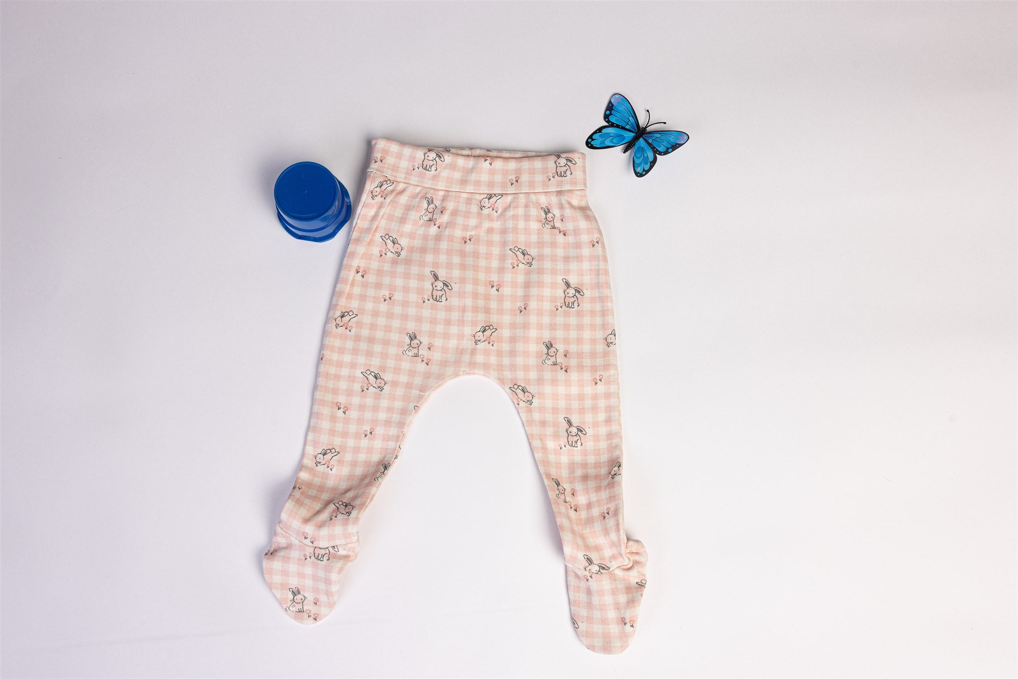 Pink plaid trousers with bunny pattern