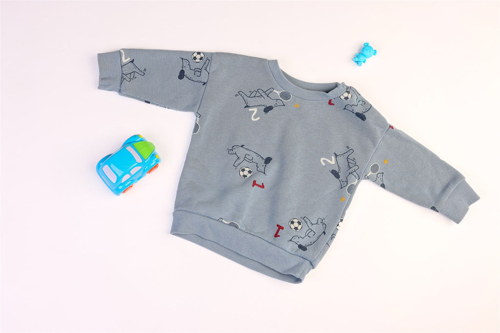 Blue long-sleeved jumper with dogs and balloons