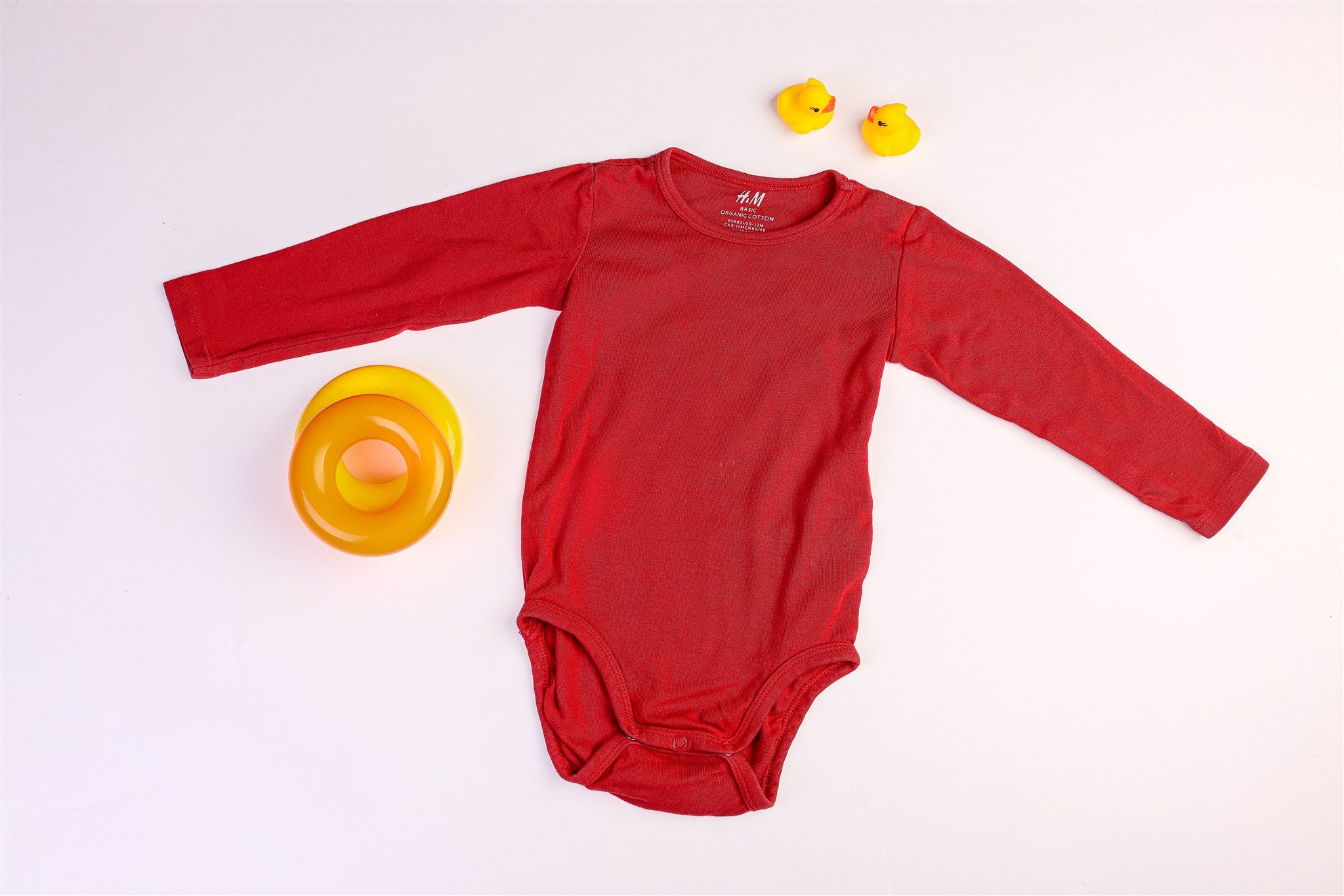 Red long-sleeved bodysuit