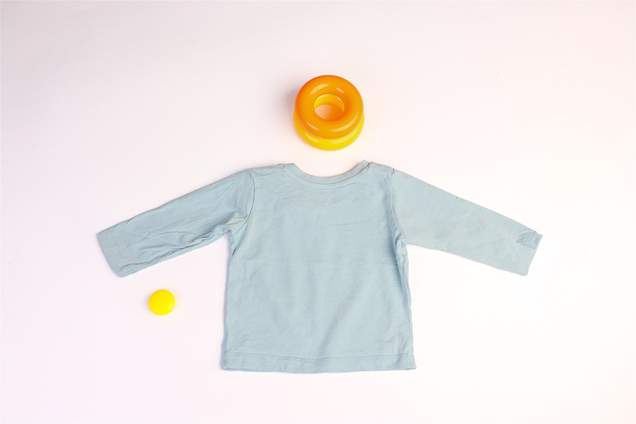 Blue long-sleeved dinosaur top