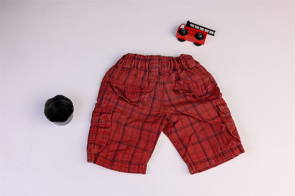Pale red plaid shorts