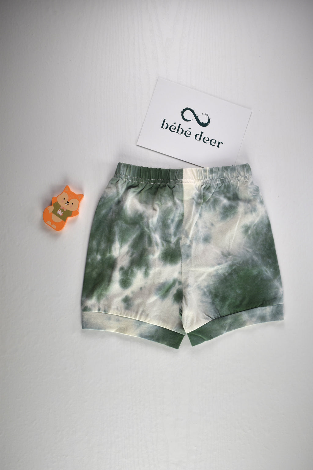 Green and white pattern shorts