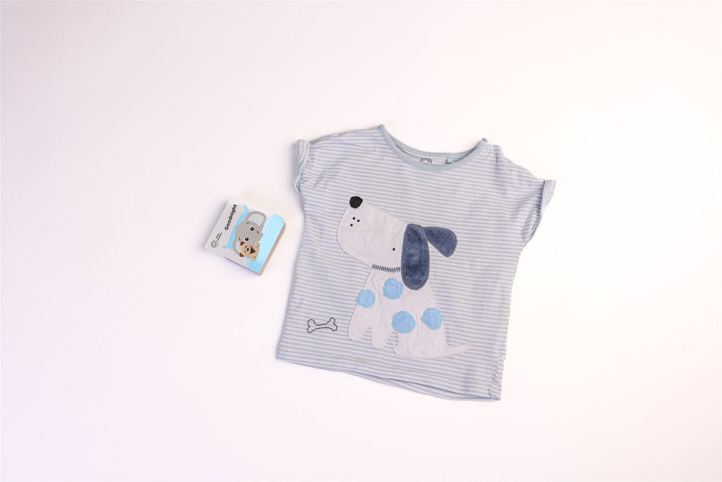 White and blue striped top with dog